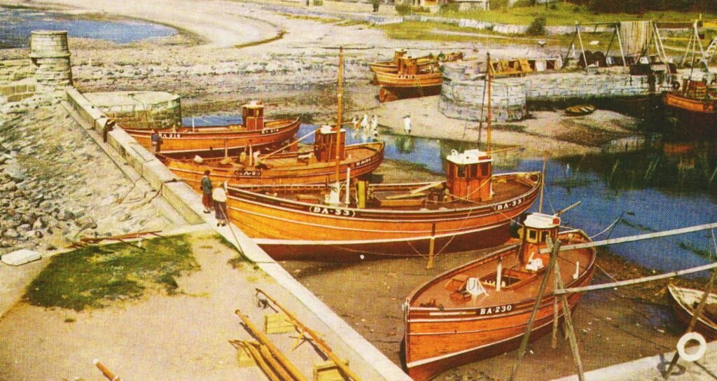 Wooden fishing boats in Dunure harbour, 1950s.